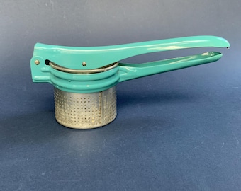 Vintage metalen citruspers, handpers, voedselpers