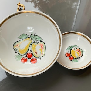The tea bowl, bowls for jam and Honey, fruit decor, Golden rim, and Riga porcelain factory Set of two.