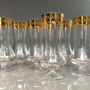 Lovely 7 glasses 200mll, Gold rimmed, UNUSED Made in Latvia in the 80s Embellished with gold rim.