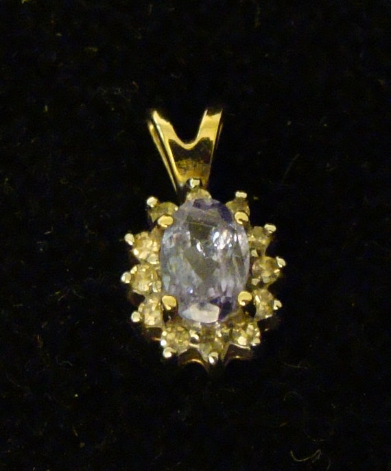Vintage oval tanzanite diamond 10k gold pendant