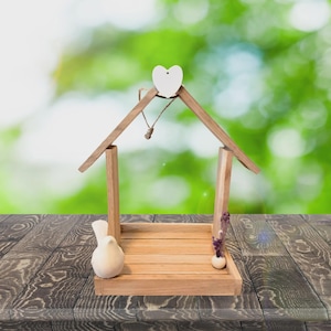 Small birdhouse with decoration for outdoors, wooden birdhouse, feeding station for birds, birdhouse, wooden birdhouse standing or hanging