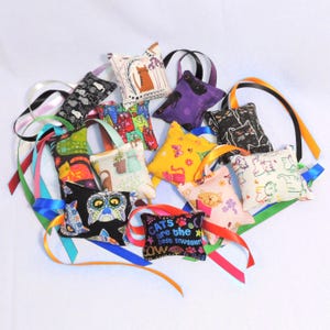 Little Catnip Toys with Ribbons (3 Toys per Pack). Quality Catnip + Silver Vine. Various Combinations of Cat Themed Patterns. Free Shipping!