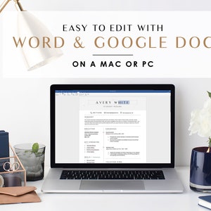 May include: A laptop computer displaying a resume template with the text "EASY TO EDIT WITH WORD & GOOGLE DOC ON A MAC OR PC" and the name "AVERY WHITE" at the top. The laptop is on a white desk with a gold lamp, a glass organizer, a glass of water, a candle, and a notebook.
