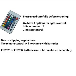 May include: A silver remote control with multiple colored buttons. Text on the image reads: "Please read carefully before ordering: We have 2 options for lights control: 1-Remote control 2-Button control. The remote control will not come with batteries."