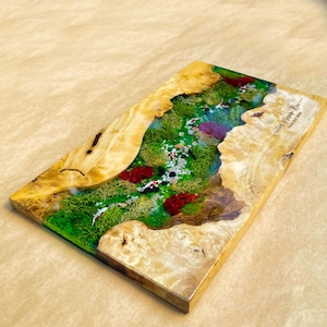 May include: A rectangular wooden resin art piece featuring a miniature koi pond scene. The design incorporates natural wood edges, green moss, red accents, and small koi fish. The text "Your Text Here" is visible on the top right corner.