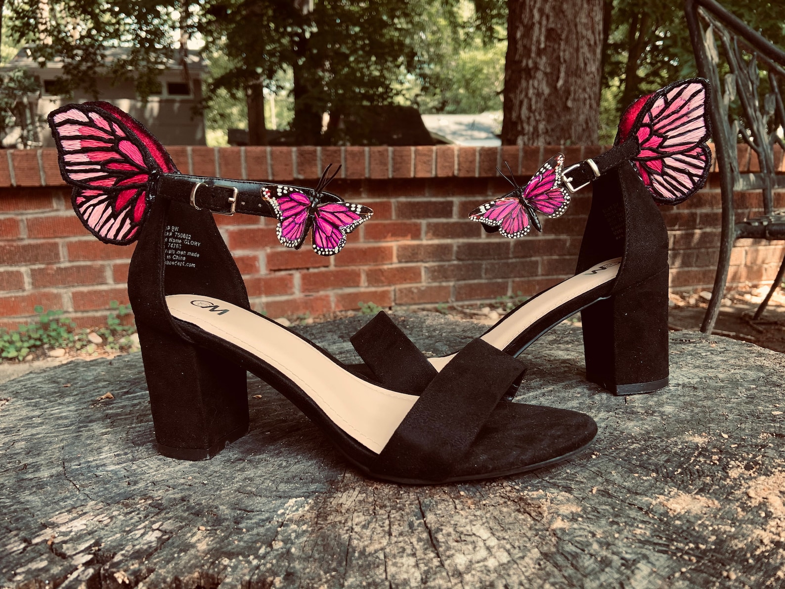 high heels with butterflies on the back