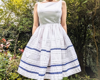 Vintage 1950s white cotton fit and flare dress with blue broderie anglaise details. By Henley Jr. 50s sun dress. Size UK 8 petite