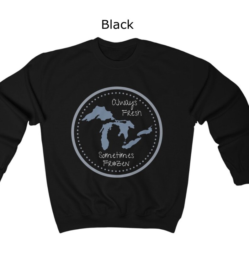 May include: Black sweatshirt with a graphic of the Great Lakes. The graphic is a circle with a dotted border and the text "Always Fresh Sometimes Frozen".