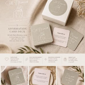 May include: A white box and cards with the text "Still Moments" and "Pause and Be Still". The cards are part of an affirmation card deck with scripture-based affirmations. The cards have a minimalist design to encourage the heart.
