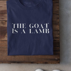 The GOAT is a Lamb Dark Unisex Jersey Short Sleeve Tee
