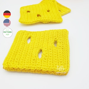 May include: Two yellow crocheted squares with holes, resembling slices of Swiss cheese. The squares are on a white background. The text "Tiffy Happy Crafts" is visible in the bottom right corner.