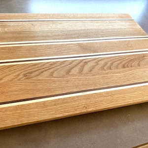 Cutting board &quot;The Floating One&quot; made of oak, walnut, and maple with Swiss edge 35.0 x 45.0 x 2.2 cm