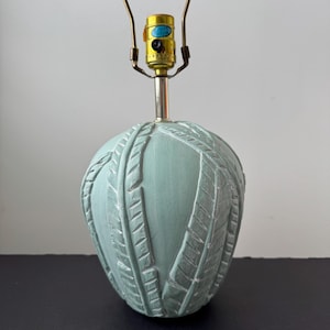 May include: A set of three ceramic mugs with a speckled, matte finish. The mugs are in shades of cream, light gray, and dark gray. Each mug has a simple, minimalist design, perfect for coffee or tea.