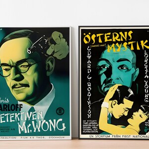 May include: Two vintage movie posters. The poster on the left is green and features Boris Karloff as Mr. Wong, a detective. The poster on the right is black and features Edward G. Robinson in "The Mystery of the Orient".