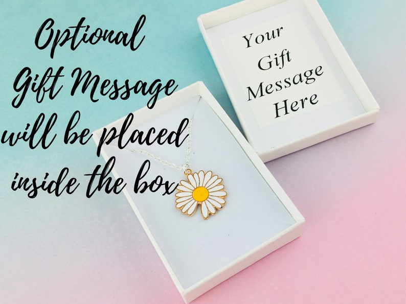 May include: A white gift box containing a daisy charm necklace. The box has a blank card inside that says "Your Gift Message Here".