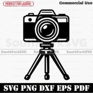 May include: Black and white illustration of a camera on a tripod. The image includes the text "Commercial Use" and "SVG PNG DXF EPS PDF". The text "Perfect for Lasers!" is also present.