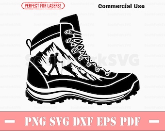 May include: Black and white graphic of a hiking boot with a mountain scene. A hiker with a backpack and walking stick is shown on a mountain path. The boot has laces and a rugged sole. Text includes "Commercial Use" and "PNG SVG DXF EPS PDF".