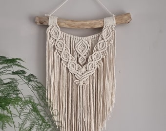 Macrame wall decoration. Boho style. Wall tapestry. Bohemian decoration. Living room. Interior.