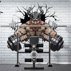 May include: A gym-themed wall mural depicting a muscular Viking lifting a barbell. The image includes the phrases "Train Hard," "No Pain No Gain," and "Only Hard Work." The background is a white brick wall.