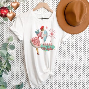 Camiseta navideña retro kitsch de los años 50 alegre y brillante, ropa navideña moderna de mediados de siglo, camiseta con arte de tarjeta navideña vintage