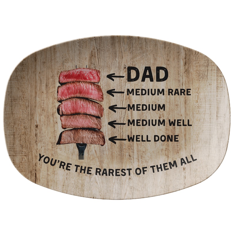 May include: A wooden serving platter with a graphic of a steak cooked to different levels of doneness. The text reads "DAD You're the rarest of them all".