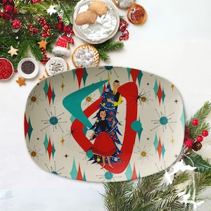Plateau de Noël kitsch rétro des années 1950, couple de vacances boomerang moderne du milieu du siècle, vaisselle atomique franciscaine en étoile
