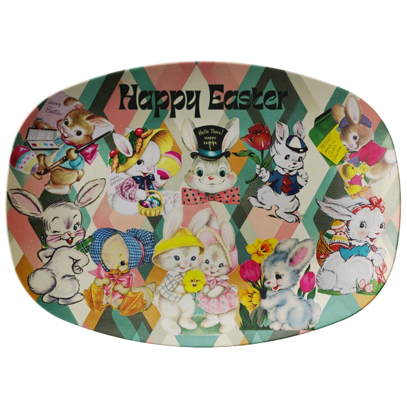 May include: An oval-shaped serving platter with a colorful design featuring bunnies, chicks, and flowers. The platter has a diamond pattern background and the words "Happy Easter" in the center.