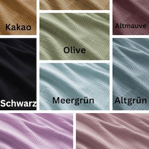 May include: A fabric swatch display featuring various colors, including Kakao, Kamel, Olive, and Altmauve. Each swatch has a textured appearance and a label with its color name. Other colors include Schwarz, Meergr&uuml;n, Altgr&uuml;n, Fieder, and Altrose.