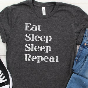 Eat Sleep Sleep Repeat Funny Phrase Unisex Tee
