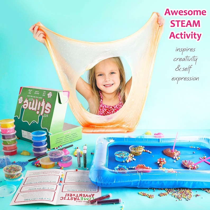 May include: A young girl smiles through a stretched, translucent orange slime. The image showcases a DIY slime kit with various colorful components, including glitter, beads, and containers. Text reads "Awesome STEAM Activity" and "DIY slime kit".