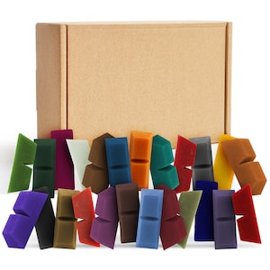 May include: A box of 20 colorful wax blocks for sealing envelopes or letters. The blocks are arranged in a semi-circle around the box, with a variety of colors including red, green, blue, purple, orange, brown, and yellow.