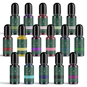 May include: A set of 15 small bottles of liquid dye in various colors, including black, white, red, green, blue, yellow, purple, and pink. Each bottle has a black cap and a label that says "Liquid Dye".