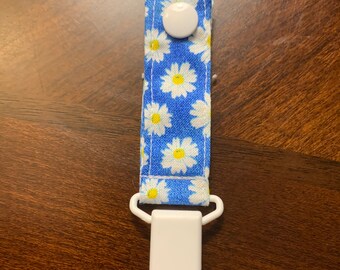 Clip per tubi di fiori blu