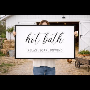 May include: A rustic wooden sign with the text "Welcome to our home" in white lettering. The sign features a distressed finish and a simple, inviting design, perfect for a front porch or entryway.