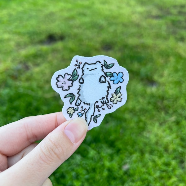 Lazy Cat in a Bed of Flowers Sticker