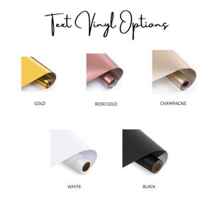May include: Text Vinyl Options displayed with five rolls of adhesive vinyl in gold, rose gold, champagne, white, and black. Each roll is labeled with its corresponding color name below the image, showcasing the available material finishes.