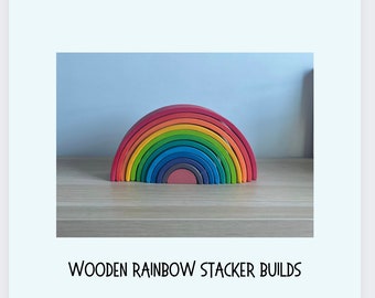 May include: A rainbow-colored wooden arch toy with 10 pieces that can be stacked to create different shapes. The toy is on a wooden surface.