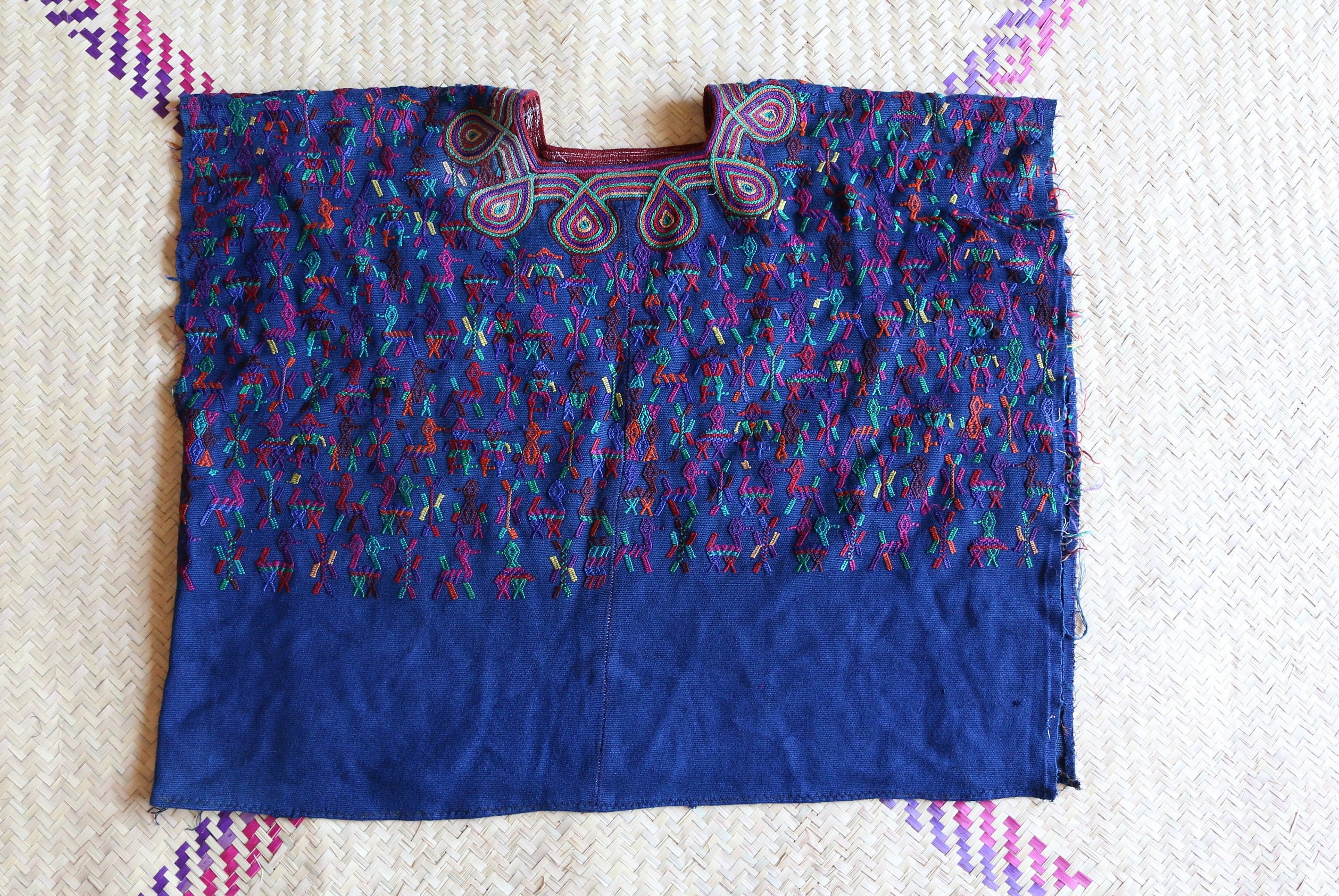 Navy blue vintage huipil from Nebaj, Quiche Guatemala, woven and brocaded on a backstrap loom