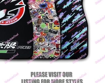 May include: Three car floor mats with distinct designs: a black mat with a Mugen Power logo and Japanese text, a white mat covered in colorful pop culture stickers, and a black mat featuring a repeating pattern of diagonal blue and purple brush strokes.