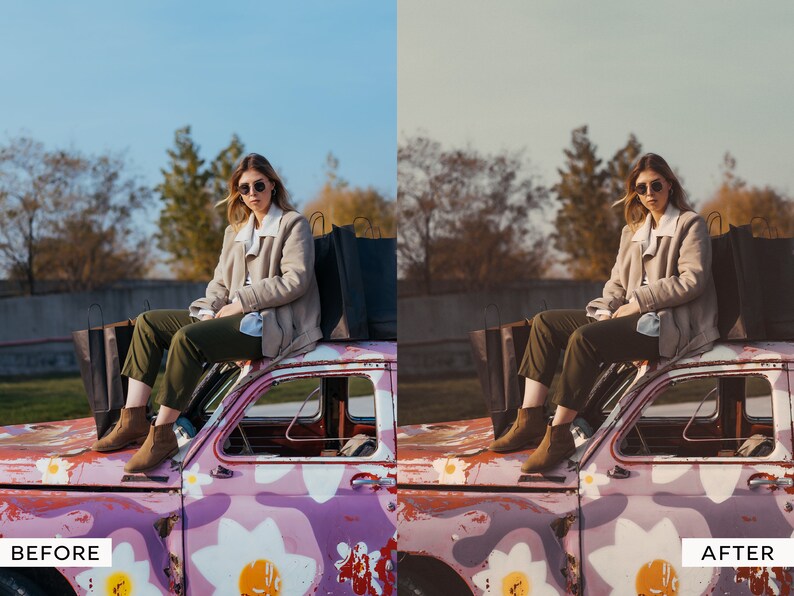 May include: A woman wearing sunglasses and a beige jacket sits on the roof of a pink car with white flowers painted on it. She is holding shopping bags.