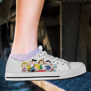 coach x peanuts clip low top sneaker with snoopy print