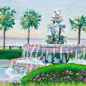 May include: A painting depicting a fountain with cascading water, surrounded by palm trees and pink flowers. The fountain is decorated with pink and blue tiles. The background shows a body of water and a cloudy sky.