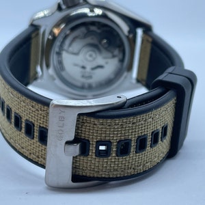 20mm, Khaki and black hybrid rubber and nylon strap with khaki stitching and steel buckle (Quick release pins)