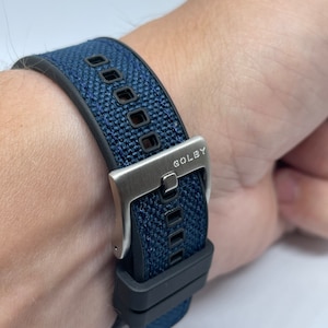 20mm, blue and black hybrid rubber and nylon strap with blue stitching and steel buckle (Quick release pins)