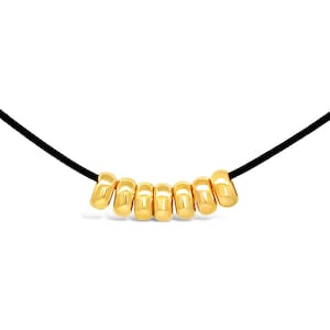 9 kt massief gouden ketting met 7 geluksringen