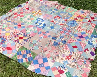 1940s Crossroads Quilt with Vibrant Colors and Feedsack Back