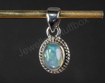 Ethiopian Opal Pendant: Rough Gemstone, Sterling Silver Jewelry