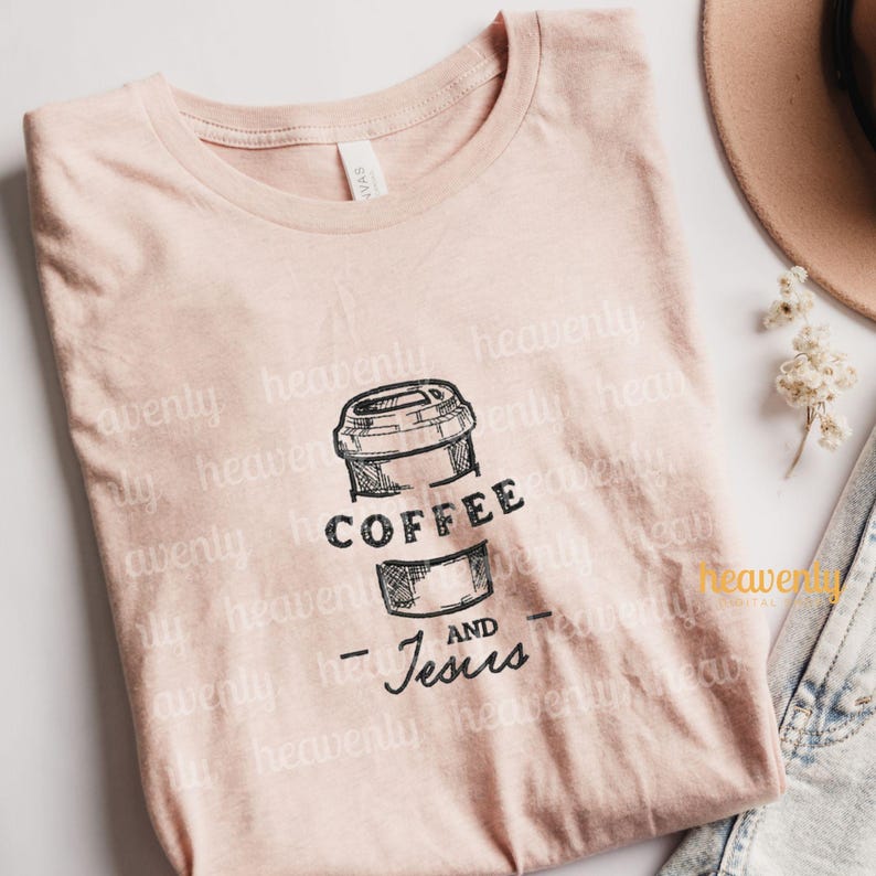 May include: A pink t-shirt with a black and white illustration of a coffee cup and the text "Coffee and Jesus".