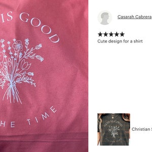 Peut inclure: Un t-shirt rose avec un motif blanc qui dit "Dieu est bon tout le temps" avec une illustration florale.
