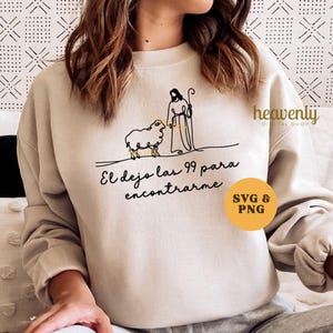 May include: A beige sweatshirt featuring a minimalist line drawing of a shepherd and a sheep. The Spanish text "El dejo las 99 para encontrarme" is below the drawing. A yellow circle with "SVG & PNG" is on the right.